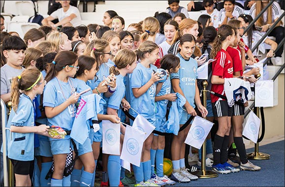 Hundreds attend city football schools' open day celebrating girls' football and get the chance to see manchester city women's team in action