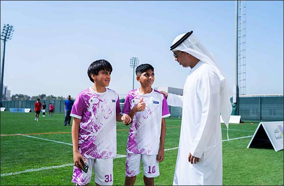 H.E. Dr. Ahmad Belhoul Al Falasi attends UAE School Games Football and praises high level of competition among participating students