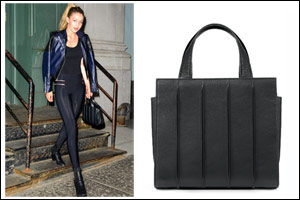 Max Mara Whitney Bag design by Renzo Piano Building Workshop + Gigi Hadid carrying Whitney Bag