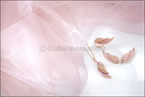 Delicate Gemstones Enhance Iconic Silhouettes in New Wings Embrace Designs From the House of Garrard