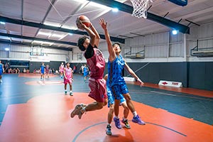 Midea Dubai Schools Games Concludes Thrilling Basketball, Indoor Cricket, and Wall Climbing Championships